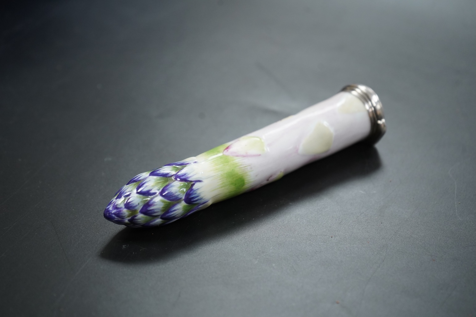 A continental silver mounted asparagus shaped bodkin case, 15cm long